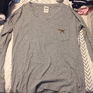 PINK long sleeve v neck shirt.